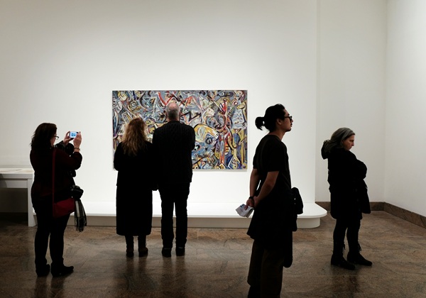 museum with people looking at art
