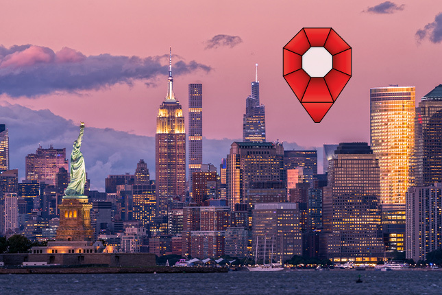 new york city skyline with pinpoint logo in corner